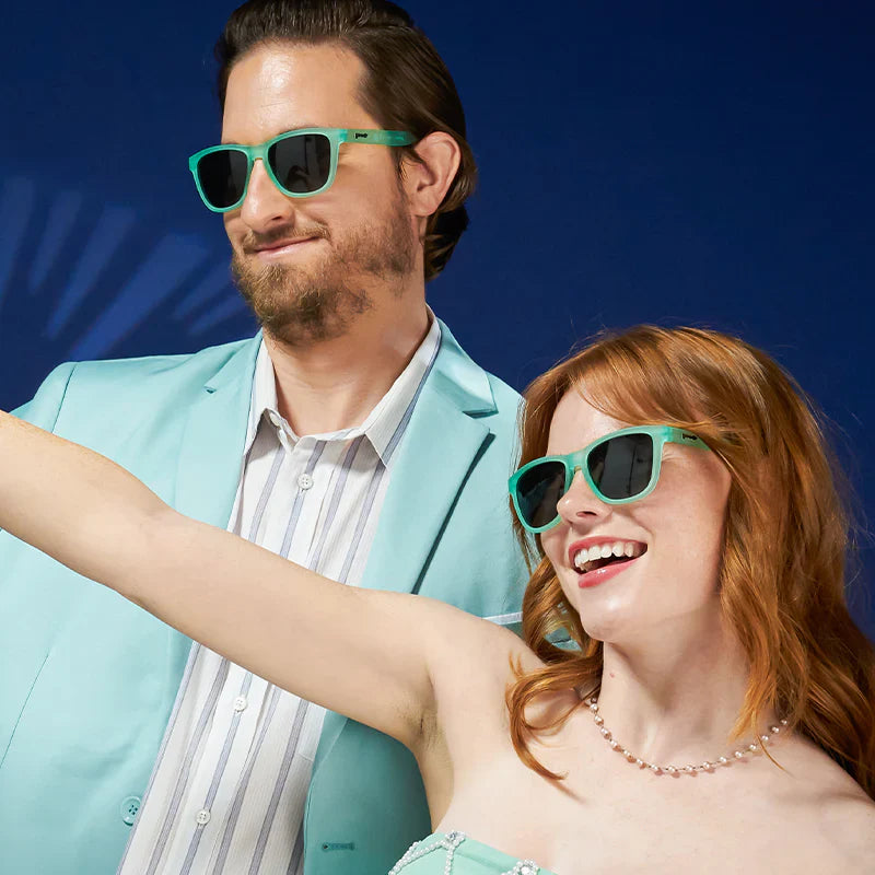 Style and fit showcase of mint green square-shaped sunglasses with gradient lenses. Example men's and women's fit. 
